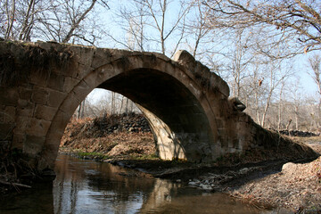 Fototapeta na wymiar Old stone bridge Glistra Konya Turkey
