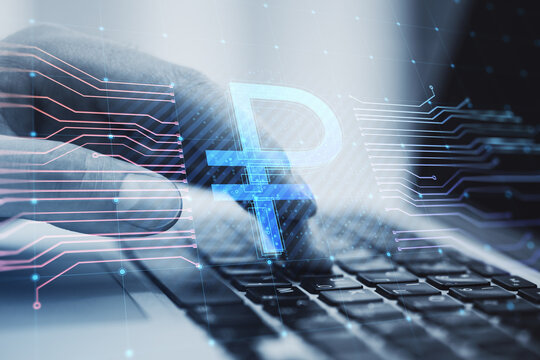 Close up of businessman hands using laptop computer with creative glowing Russian ruble circuit hologram on blurry background. Digital money and online banking concept. Double exposure.