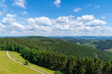 Landscape at Schomberg in Sauerland. Nature with forests and hiking trails near Sundern on the Lennegebirge.
