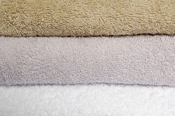 Fototapeta na wymiar Stack of clean soft towels as background, closeup