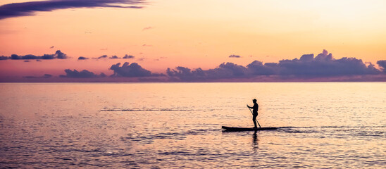 Travel.Silhouette man sea sup at sunset.outdoor travel.paddle standing, silhouette  man  beach ...