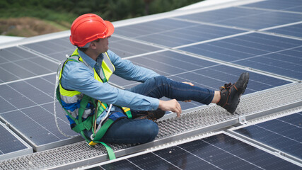 Construction workers clean solar panels for energy.Renewable Energy Battery Clean Mountain Climber...