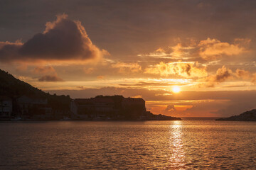 Naklejka premium Sunset over the anchorage of Zaklopatika, on the island of Lastovo, Dubrovnik-Neretva, Croatia