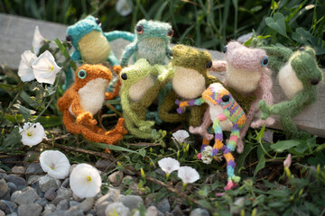 knitted frogs on the grass