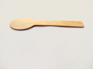 small wooden spoon in the cooking kitchen