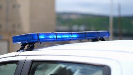 Closeup of blue lights on roof of police car