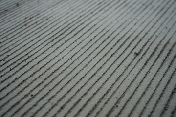 reinforced concrete road surface (scratches make the skin rough)