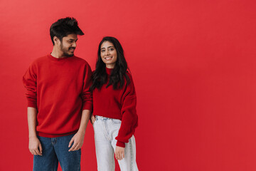 Young indian couple laughing while posing together