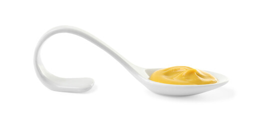 Mustard in ceramic serving spoon isolated on white