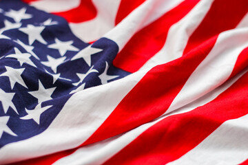 american flag placed on a black wooden table On American Independence Day.