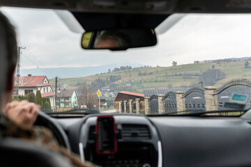 Nice view from a car on city and mountains. Travel destination. 