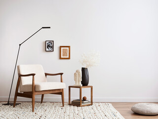 Minimalist composition of elegant living room space with white boucle armchair, photos mock up...
