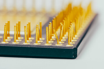 Bent pin on the processor socket. Close-up, selective focus.