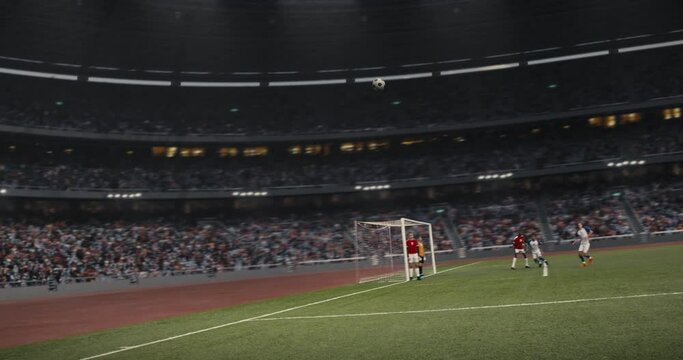 Video of an intense moment as a player in a blue jersey scores a goal with a powerful header
