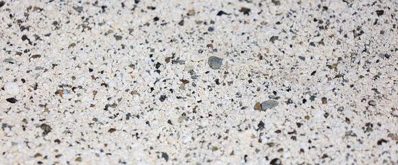 White volcanic limestone rock as background.