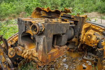 Rusty hull of a wrecked tank.