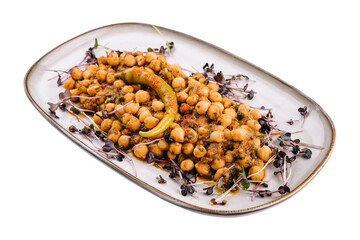 Spicy chickpea curry, chana masala or choley in plate with chapati