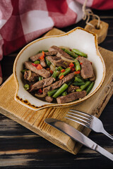 Veal with green beans and chilli pepper