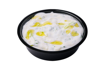 Tasty tartar sauce on a black bowl