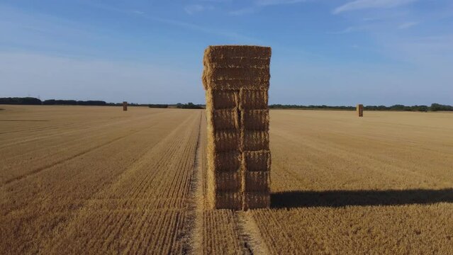 Drone shot. Haystack in freshly harvested corn field. East Yorkshire.England.UK 10.08.2022
