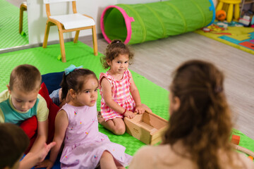 teacher and kids in day care