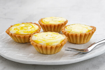 Golden Brown Fresh Cheese Tart served on plate
