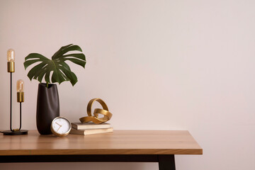 Minimalist composition of elegant home office space with design chair, black vase with leaf,...