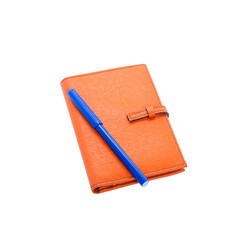 Orange diary and blue pen isolated - obrazy, fototapety, plakaty