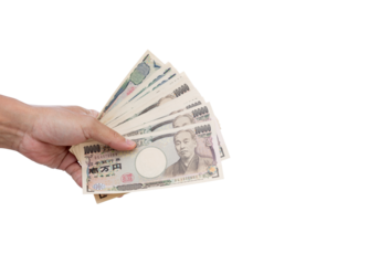 Hand holding ten thousand Yen banknote