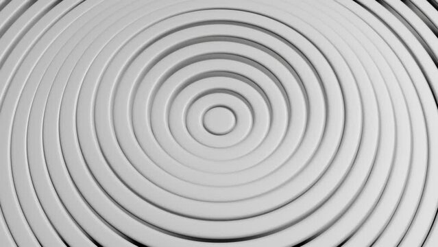 Abstract circle pattern with displacement effect. Animation of white clean rings. Background for a business presentation. A continuous loop 3D rendering in 4K resolution.