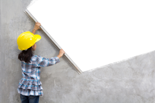 Little girl engineering ideas concept with hand holding plastering tools 