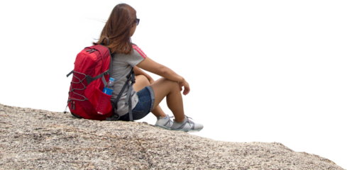 Woman with backpack sit in the mountain with empty free space