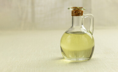 Sunflower oil in a glass bottle, dissolved in a solution