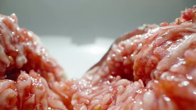 Fig fruit torn in half, pulp close-up, on a white background Dolly slider