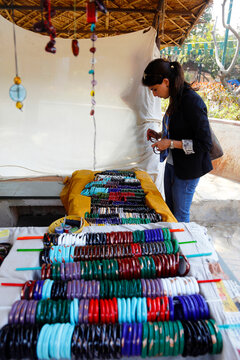 Young Woman Bangle Shopping In A Street Market, New Delhi, India