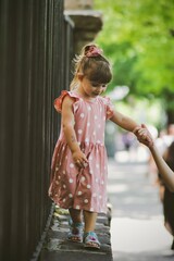 Naklejka premium child playing in a park in sofia bulgaria 