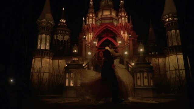 A Couple dancing with attraction on the dance floor inside the castle