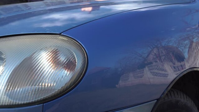 painted car wings,the result of painting the car, a noticeable difference in the color of the car wing after repair