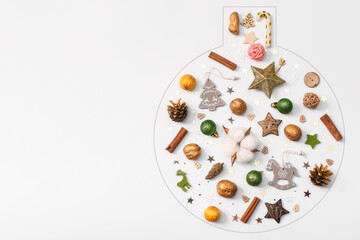 Christmas composition with cones, nuts, toys, cinnamon, Christmas balls on a white background. Isolate. New Year. Flat position, top view. Copy space for text
