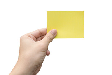 Hand holding yellow paper isolated on white with clipping path.