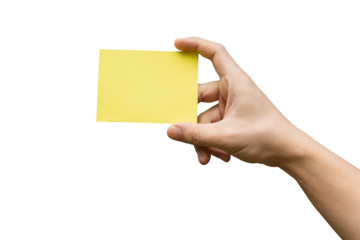 Hand holding yellow paper isolated on white with clipping path.