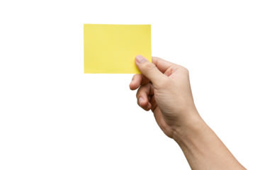 Hand holding yellow paper isolated on white with clipping path.