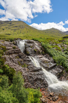 The Meeting Of The Three Waters, Glencoe. The Waterfall Is Situated At The Foot Of The Three Sisters Of Glen Coe - A Popular Hiking And Skiing Area. 