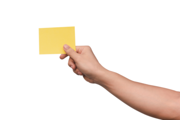 Hand holding yellow paper isolated on white with clipping path.