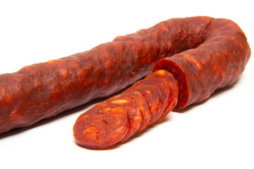 Spanish chorizo sausage on white background