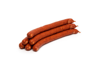 Smoked grilled thin Pork Sausages, close-up, isolated on white background
