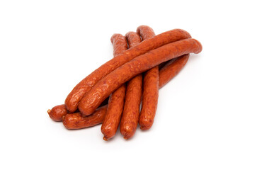 Smoked grilled thin Pork Sausages, close-up, isolated on white background