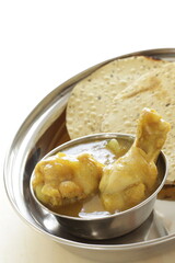 Chicken curry and pancake with copy space