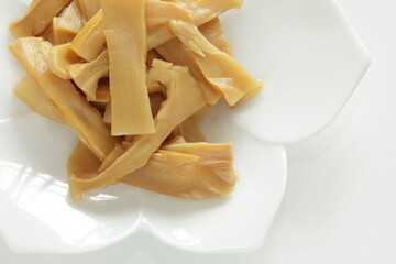 Chinese food, pickled bamboo shoots on white dish for side dish image