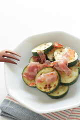 Chinese food, cucumber and bacon stir fried with copy space